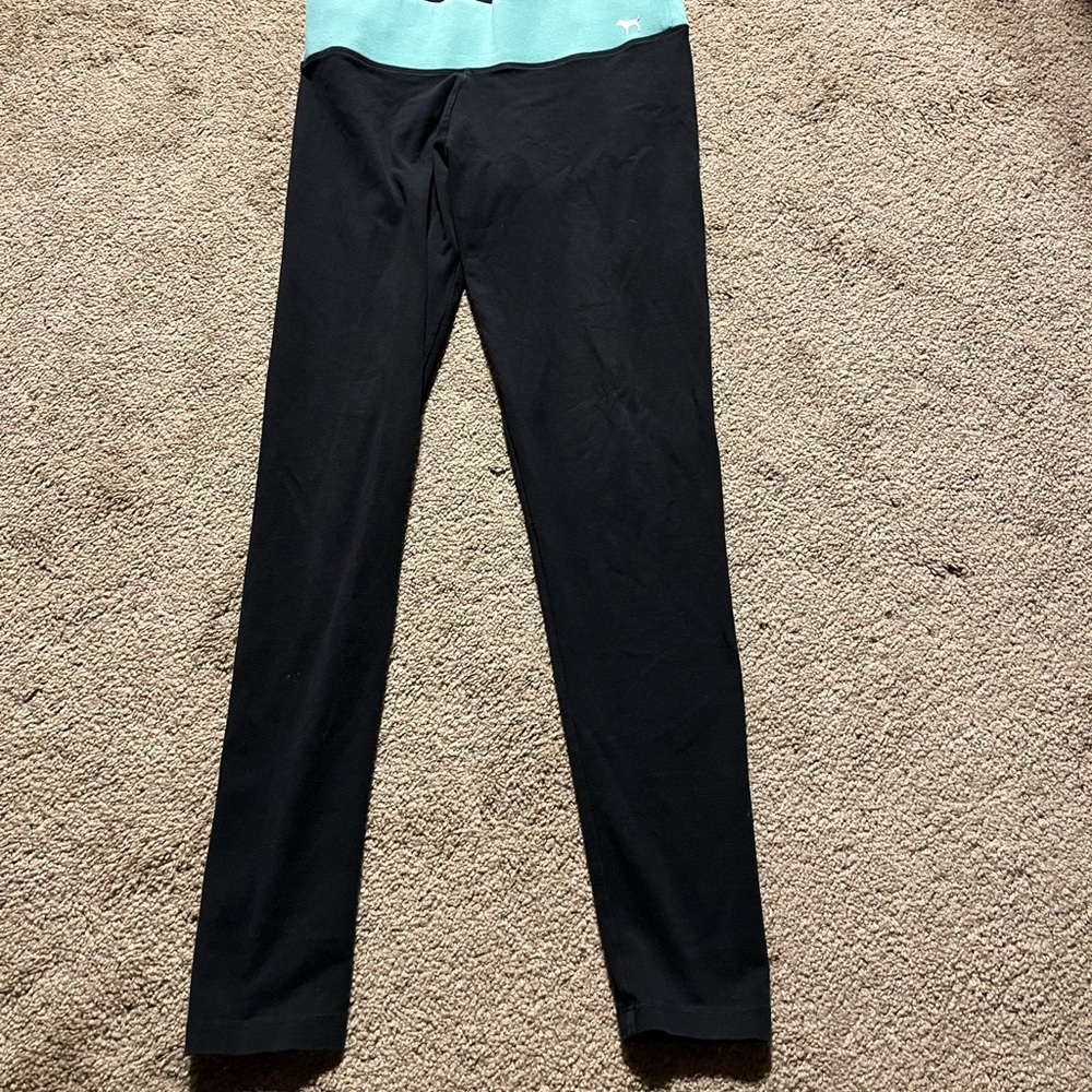PINK VS YOGA PANTS IN WOMENS SMALL-AQUA BAND WITH WHITE LETTERING